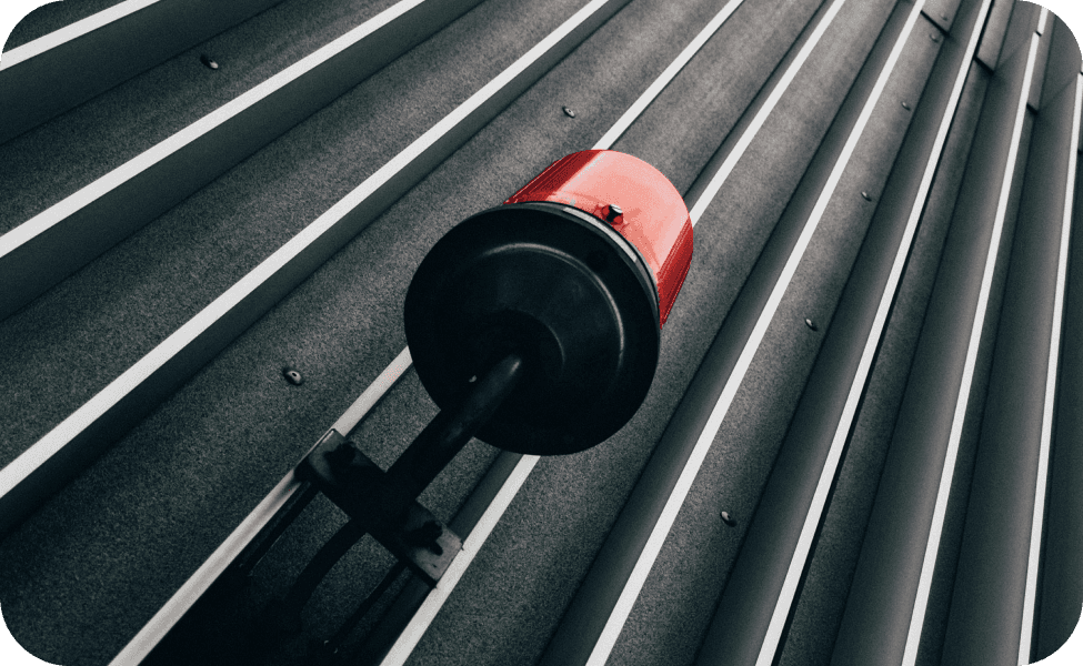 Alert bell on a metal surface