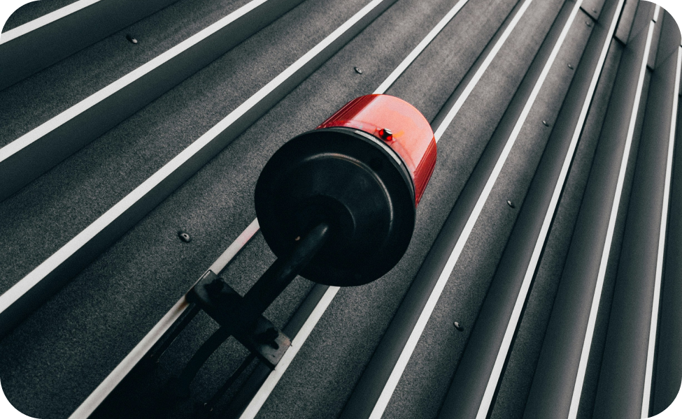 Alert bell on a metal surface